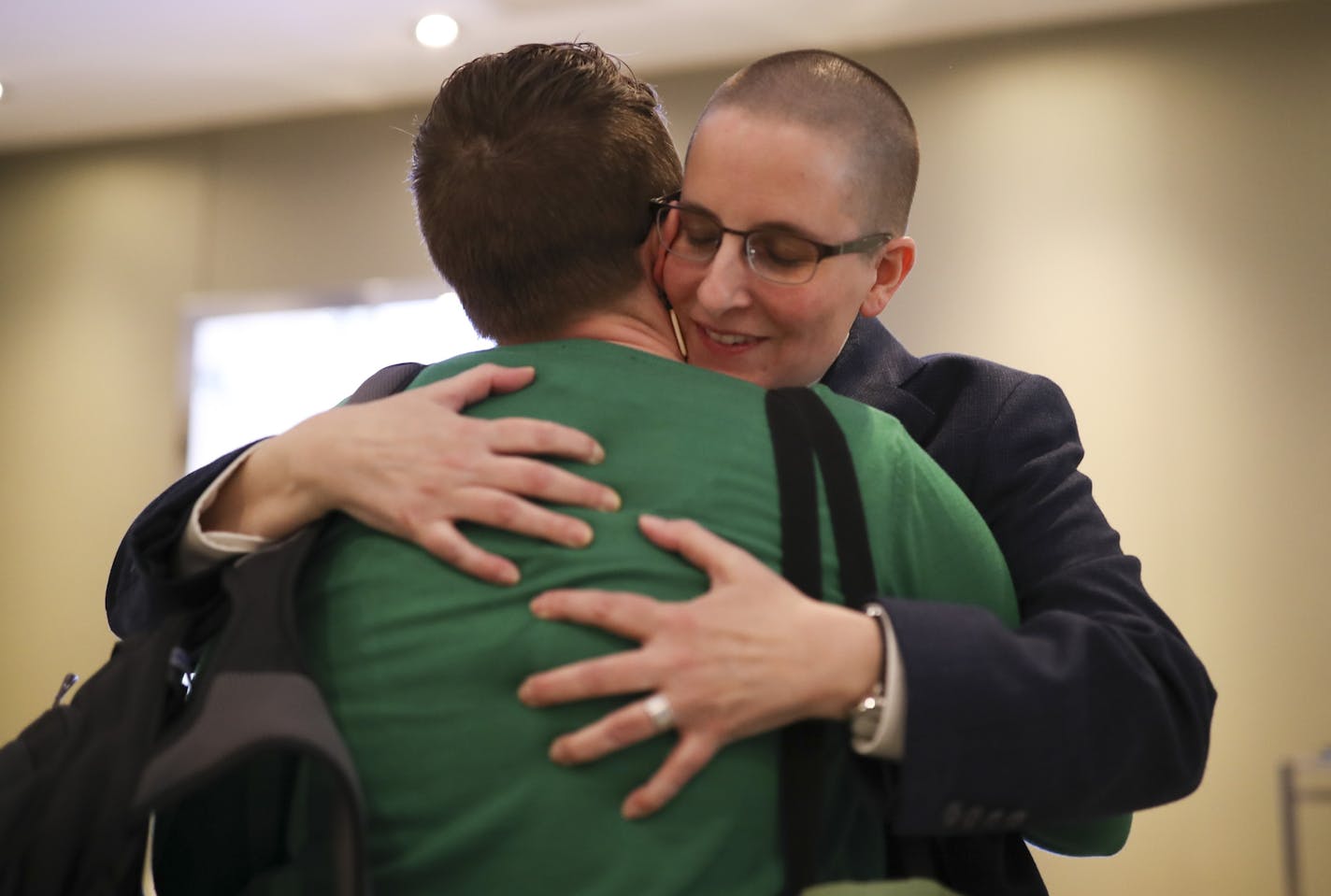 2018 Minnesota Teacher of the Year, Kelly D. Holstine, embraced her wife, Emma Freeman, after being named the 54th recipient of the honor Sunday afternoon. ] JEFF WHEELER &#xef; jeff.wheeler@startribune.com Kelly D. Holstine, an English teacher at Tokata Learning Center, an alternative high school in Shakopee, was named the 2018 Minnesota's Teacher of the Year by Education Minnesota during a luncheon Sunday afternoon, May 6, 2018 at the Radisson Blu at the Mall of America in Bloomington.