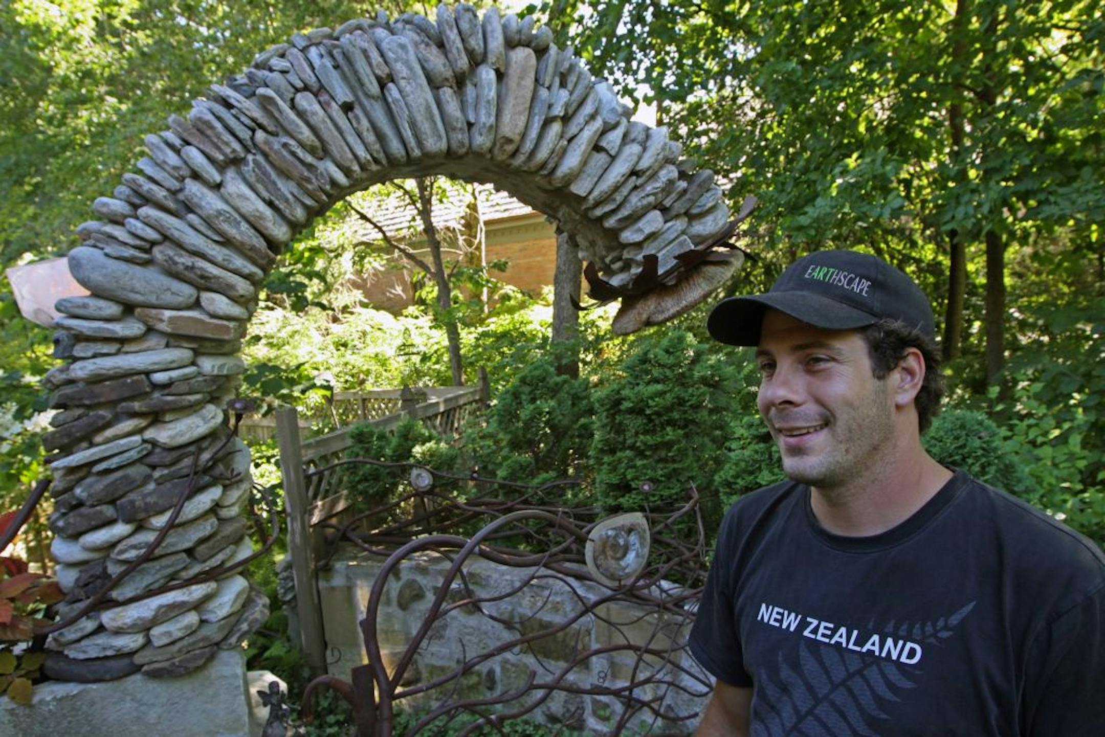 Shane Schaaf designed and built this gravity-defying stone arch for an Eden Prairie yard.