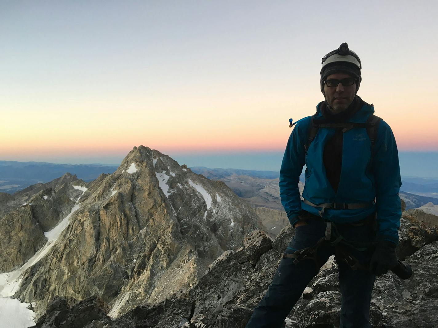 At the top of Grand Teton, a Wyoming peak, the morning light glows. Photo provided by Emily Sohn