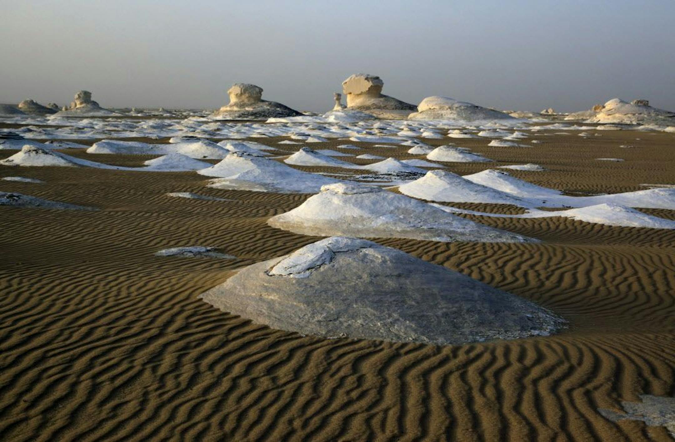 FILE - This Saturday, May 19, 2013 file photo shows a view of the Egyptian White desert, about 500 kilometers (310 miles) southwest of Cairo, Egypt, where at least 12 tourists were mistakenly killed by Egyptian armed forces.