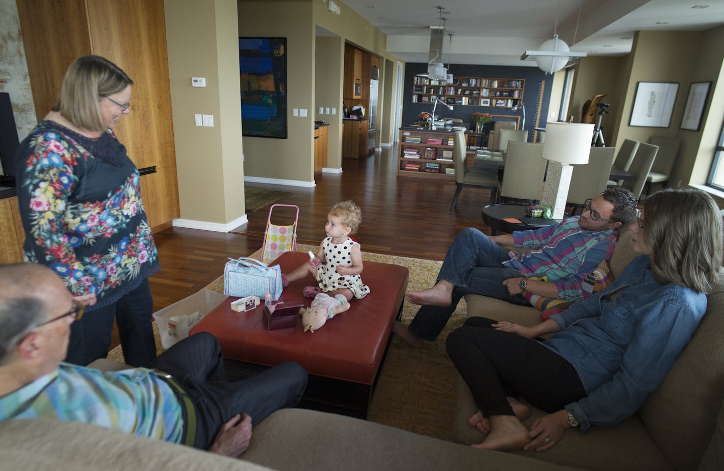 At the Calyle Condos in downtown Minneapolis, Betsy Kuller and her husband Ben Berger live there with daughter Roslyn,2. Kuller's parents, Susie and Hart live in a larger unit on the 30+ floor.] Richard Tsong-Taatarii/rtsong-taatarii@startribune.com