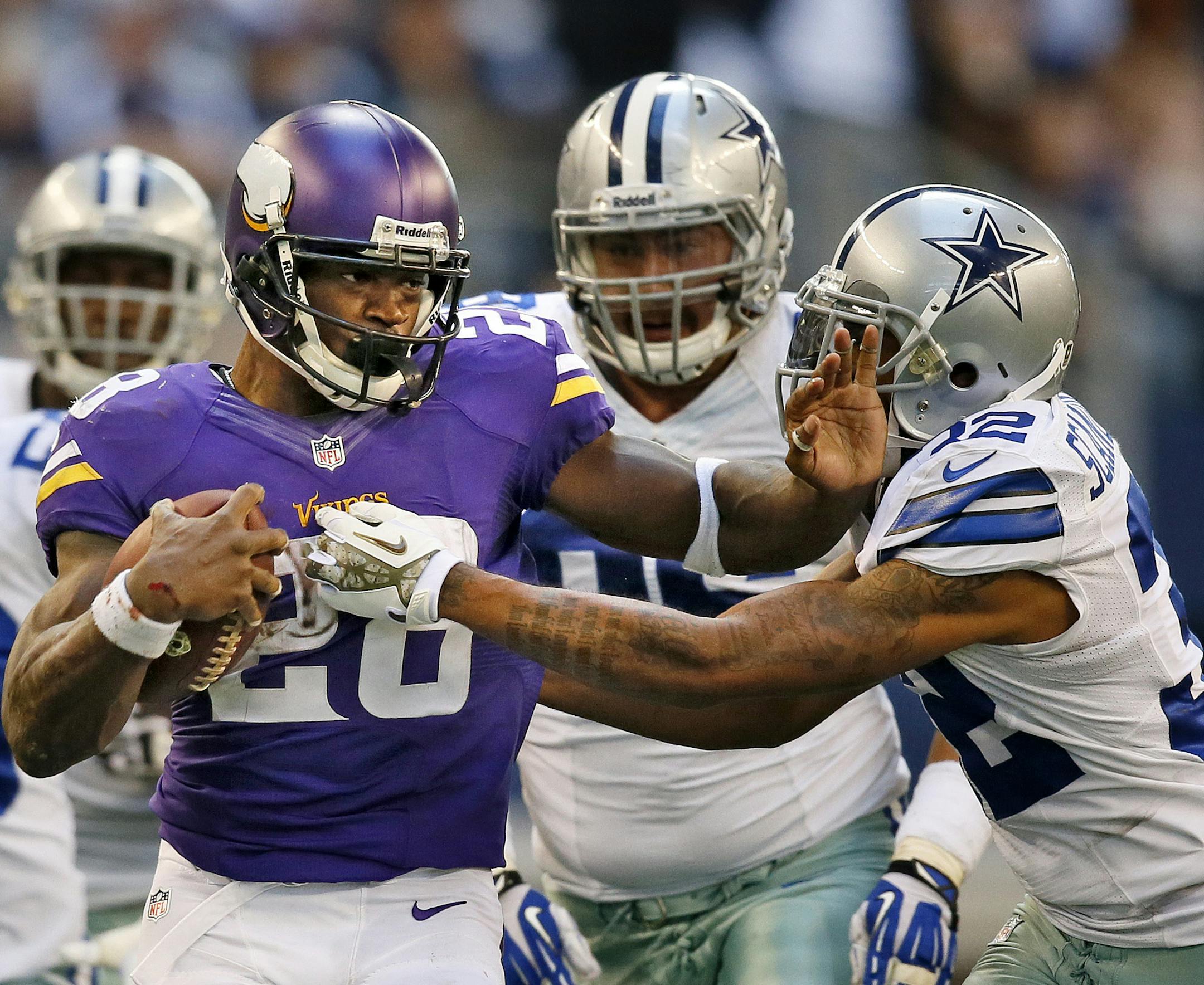Adrian Peterson plows his way down the field for a 55 yard run in the 4th quarter. ] Minnesota Vikings vs Dallas Cowboys, AT&T Stadium. Dallas, TX - 11/03//2013 ORG XMIT: MIN1311031604526876