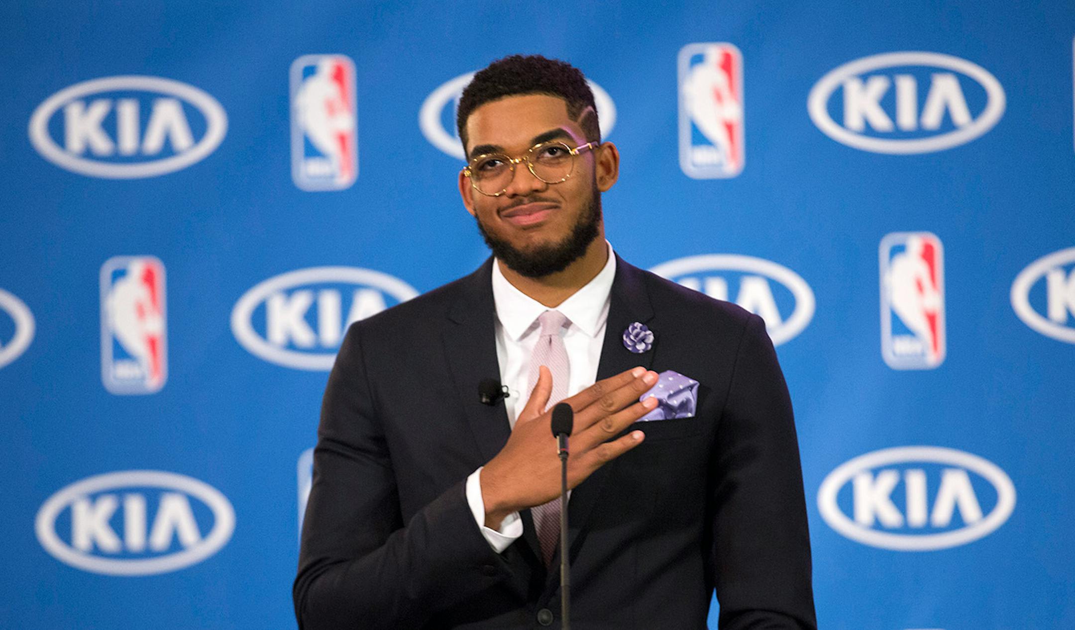 Karl-Anthony Towns patted his heart while thanking his family for their lifelong support on May 16, 2016 in Minneapolis.
