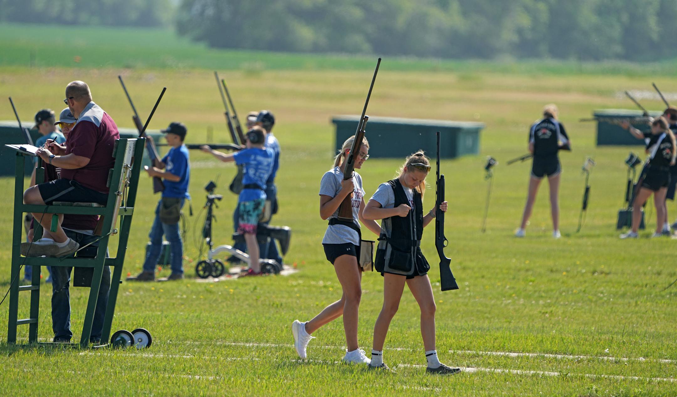 Brookelinn Finkelson and Ashley Paulson from the Ashby Arrows trap shooting team, during the competition.
