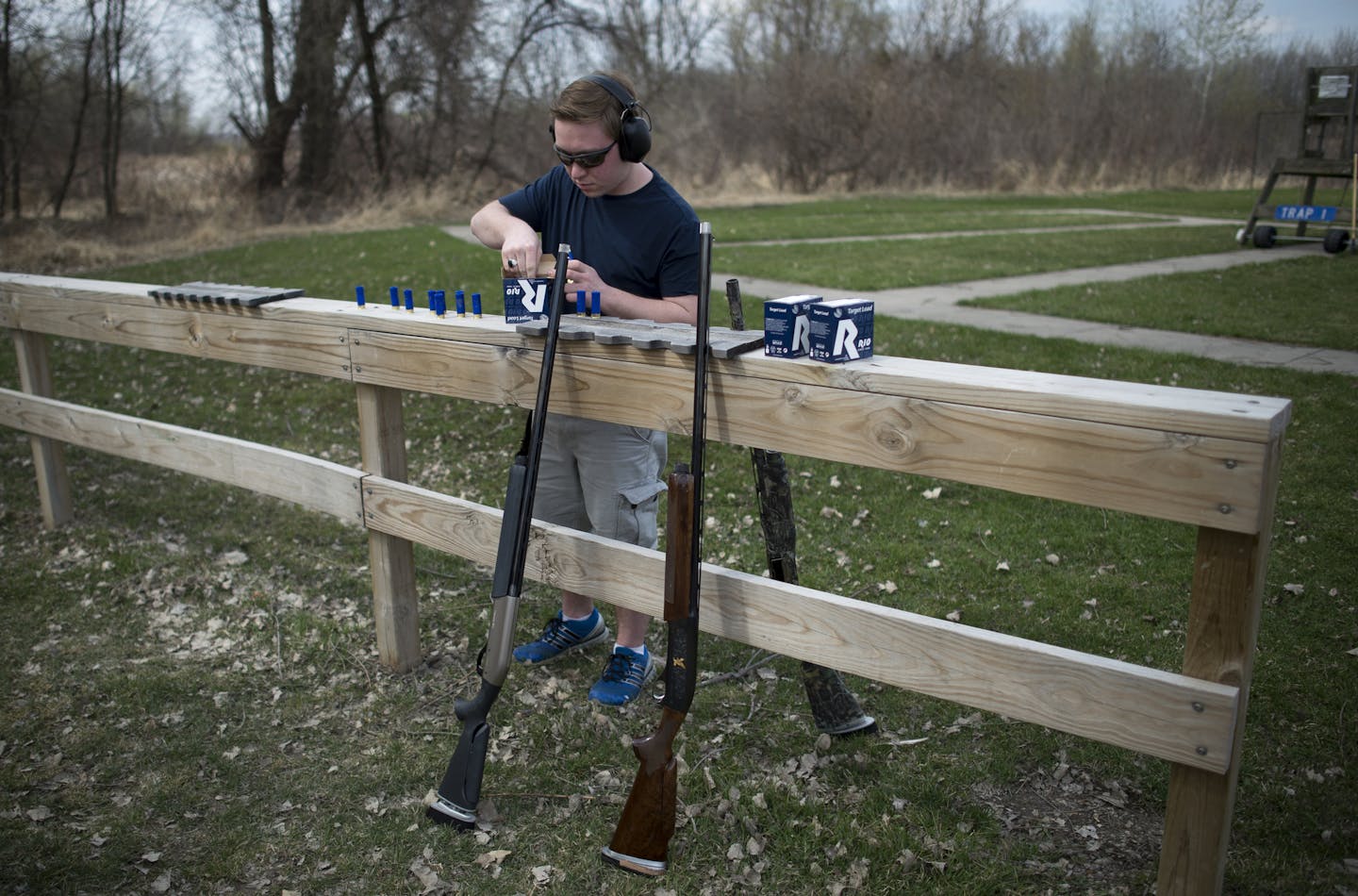 Bryce Wisnewski, a senior at Wayzata and member of the varsity team, prepares shotgun rounds before shooting practice on Thursday afternoon. This is Wisnewski's third year shooting. ] (Aaron Lavinsky | StarTribune) aaron.lavinsky@startribune.com Photos to accompany an Outdoors Weekend story about the wild popularity of high school trapshooting teams in Minnesota. The Wayzata Clay League team was photographed on Thursday, April 16, 2015 at the Park Sportsmens Club in Wayzata.