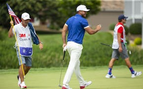 Brooks Koepka salutes the crowd after making par on the fourth hole. ALEX KORMANN ¥ alex.kormann@startribune.com Competitors for the 3M Open took to 