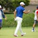 Brooks Koepka salutes the crowd after making par on the fourth hole. ALEX KORMANN ¥ alex.kormann@startribune.com Competitors for the 3M Open took to 