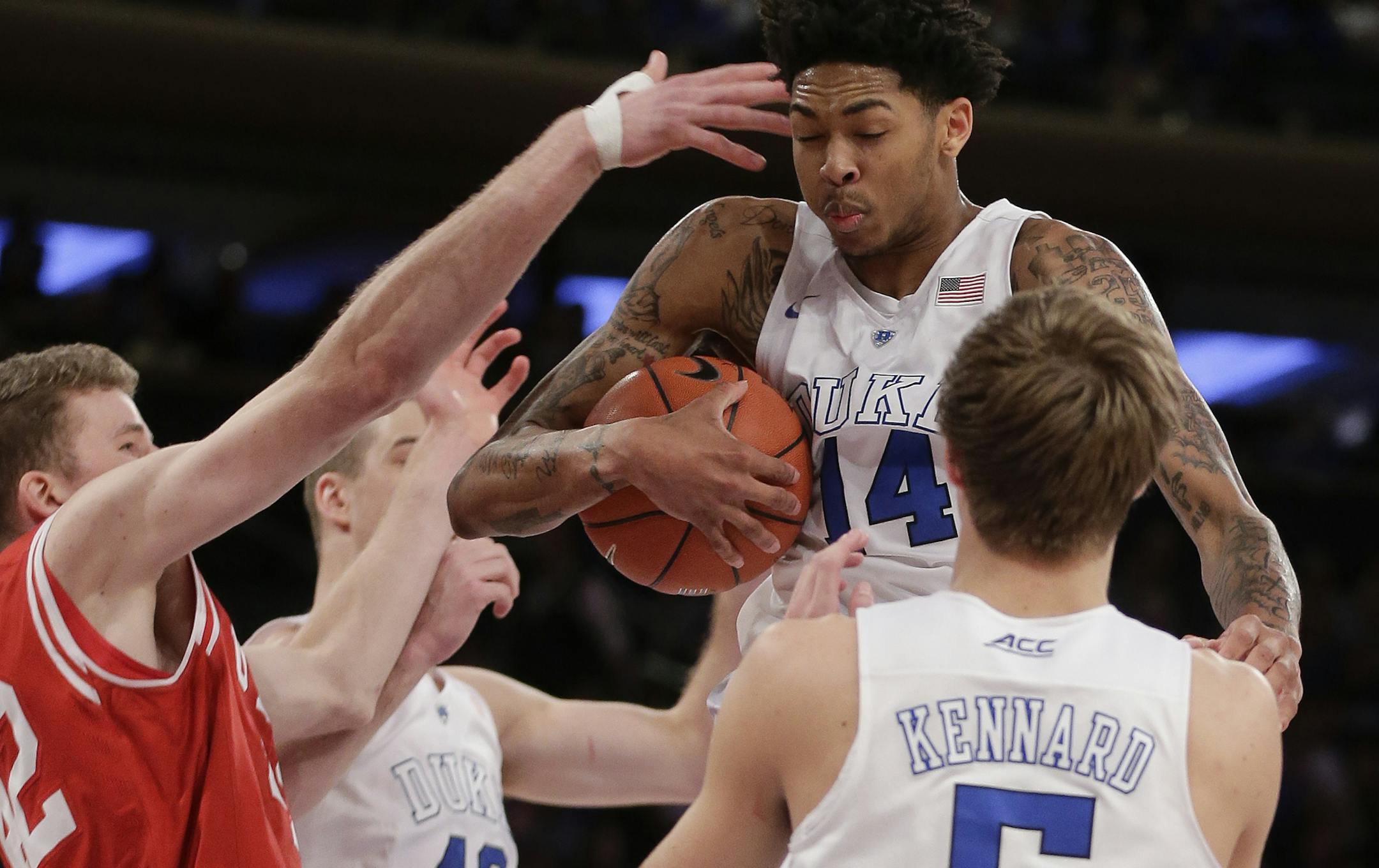 Duke guard Brandon Ingram (14) grabs a rebound against Utah during the second half of an NCAA college basketball game, Saturday, Dec. 19, 2015, in New York. (AP Photo/Julie Jacobson)