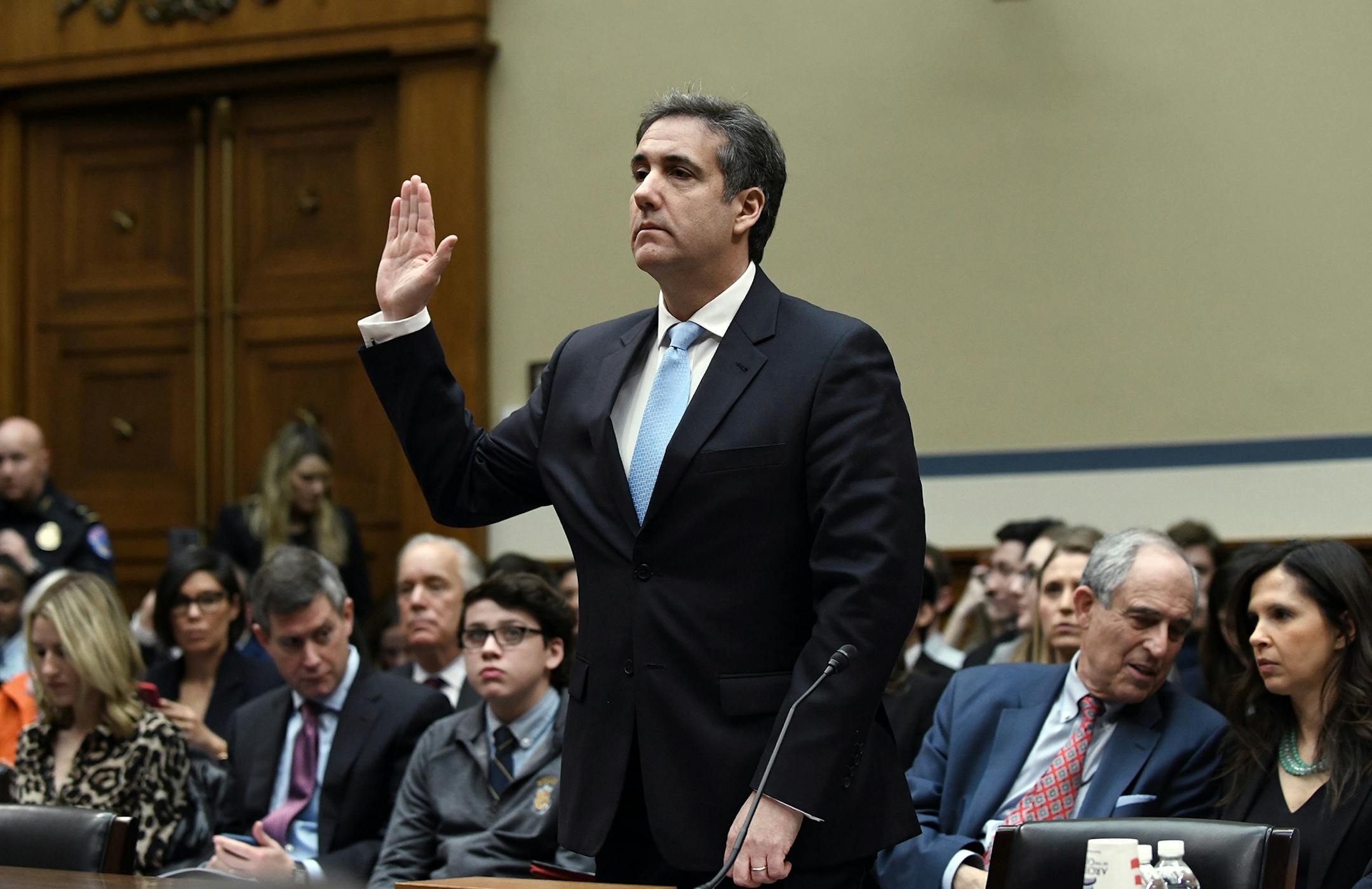 Michael Cohen, former attorney for U.S. President Donald Trump, is sworn in before testifying before the House Oversight and Reform Committee in the Rayburn House Office Building on Capitol Hill in Washington, D.C. on Wednesday, February 27, 2019.