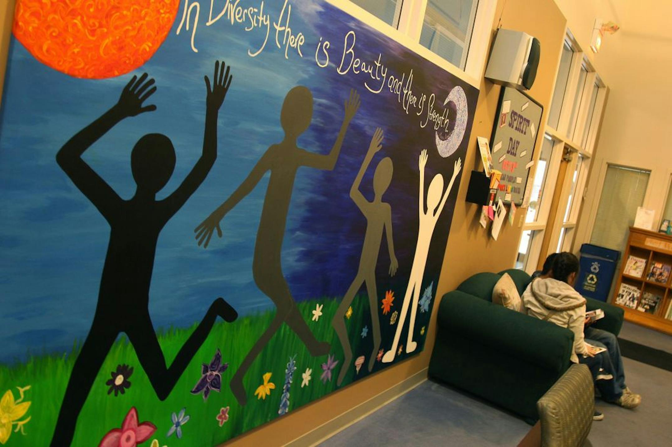 Teens wait in the Face-to-Face Clinic waiting area before their appointmets Wednesday, October 17, 2012. Founded in 1972 on St. Paul's east side, the Face-to-Face Clinic helps homeless youth from ages 11 to 23. The clinic plans to celebrate its 40th birthday on Oct. 22. They serve 3,400 youths a year with everything from food and clothing to counseling and pregnancy assistance. (ELIZABETH FLORES/STAR TRIBUNE) ELIZABETH FLORES � eflores@startribune.com