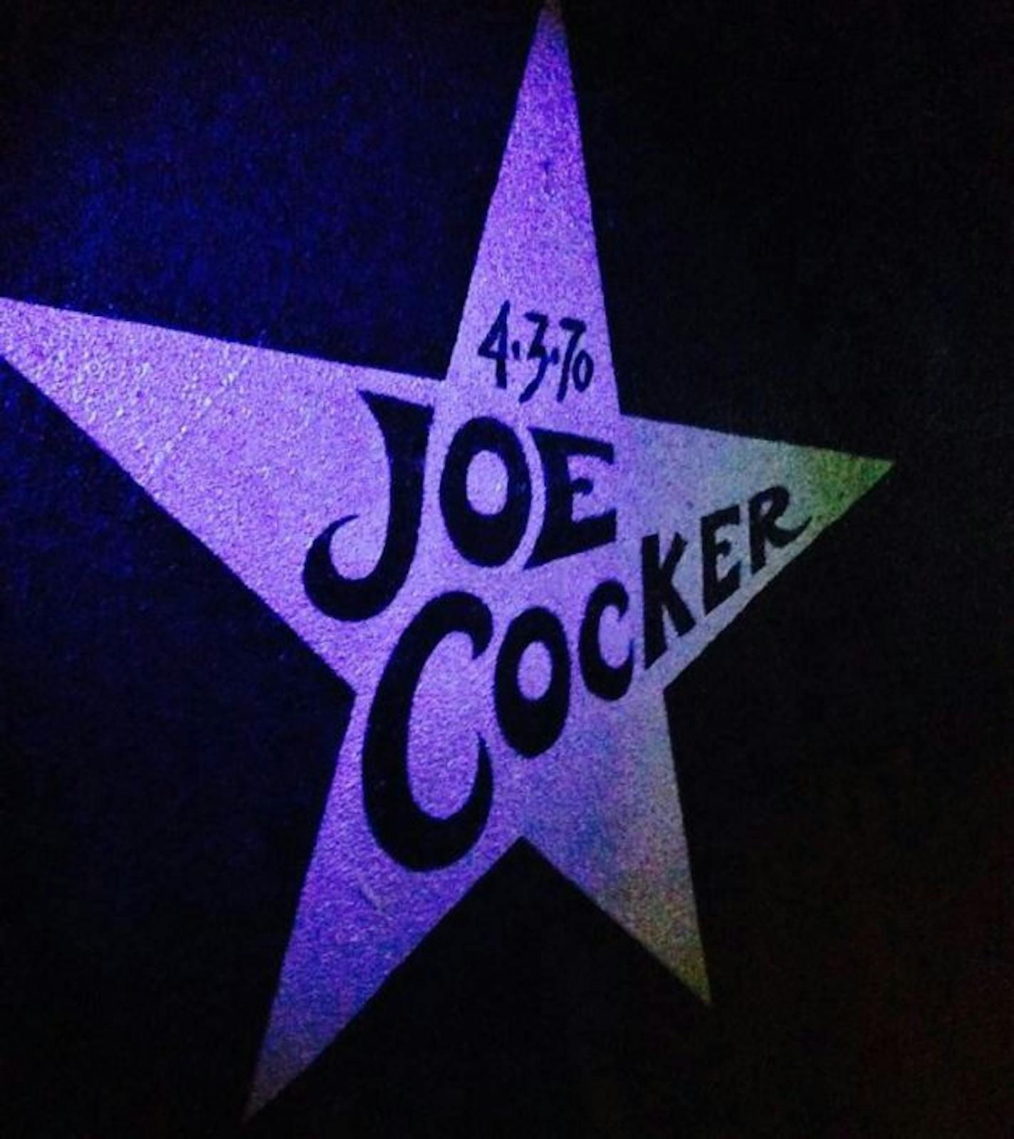 Cocker's star on the wall inside First Avenue.