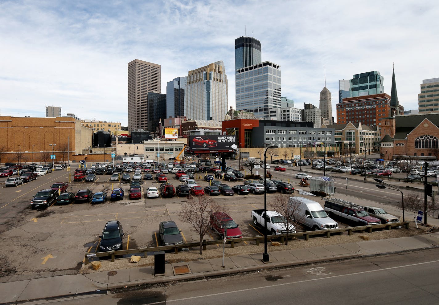 Surface parking at 1022 Hennepin Ave, Minneapolis, MN ] JOELKOYAMA&#x201a;&#xc4;&#xa2;jkoyama@startribune Minneapolis, MN on March 28, 2014. One of the most common and blighting elements of Minneapolis' urban core, surface parking lots, are about to face some extra scrutiny from City Hall. Council Member Jacob Frey, who represents half of downtown, is pushing for more enforcement of the city's landscaping ordinances for surface parking lots. Surface parking lots are the enemy of many a city plan