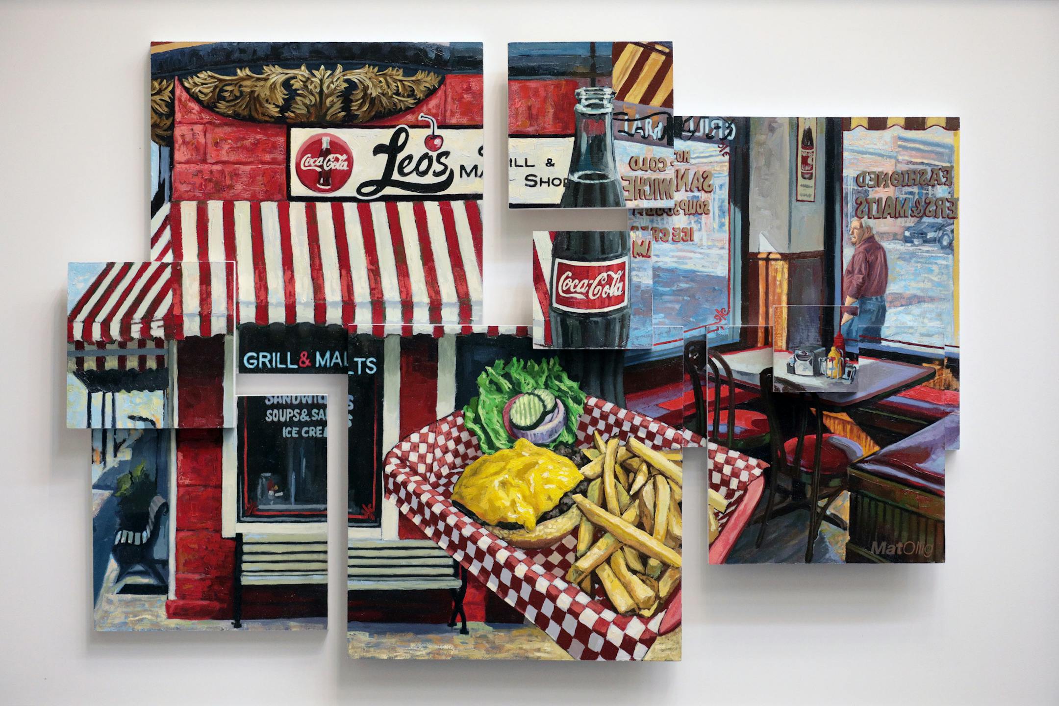 A finished and assembled piece from artist Mat Ollig's diner series hung in his studio Wednesday morning. ] ANTHONY SOUFFLE • anthony.souffle@startribune.com Artist Mat Ollig is working on his project painting a handful of the most classic diners from around the state Wednesday, Dec. 7, 2016 at his Studio in Minneapolis. Now finishing up, he's launching a scavenger hunt of sorts to introduce his art and the beloved old-style food joints to the public