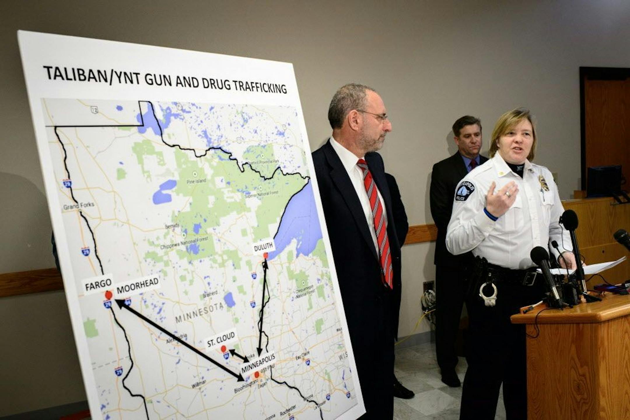 U.S. Attorney Andrew Luger and Minneapolis Police Commander Catherine Johnson announced federal drug trafficking charges against two north Minneapolis-based gangs.