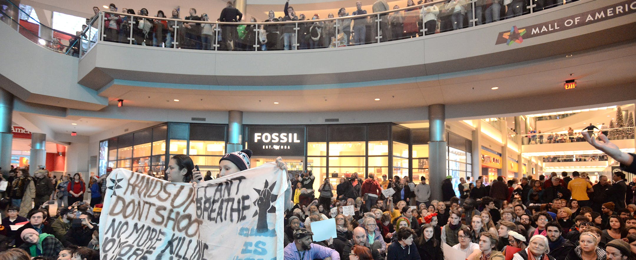 Protestors at the Mall of America in Bloomington, Minn., on Saturday, Dec. 20, 2014, during a demonstration to focus attention on perceived nationwide race-based police misconduct. (Aaron Lavinsky/Minneapolis Star Tribune/TNS) ORG XMIT: MIN1412201808380099