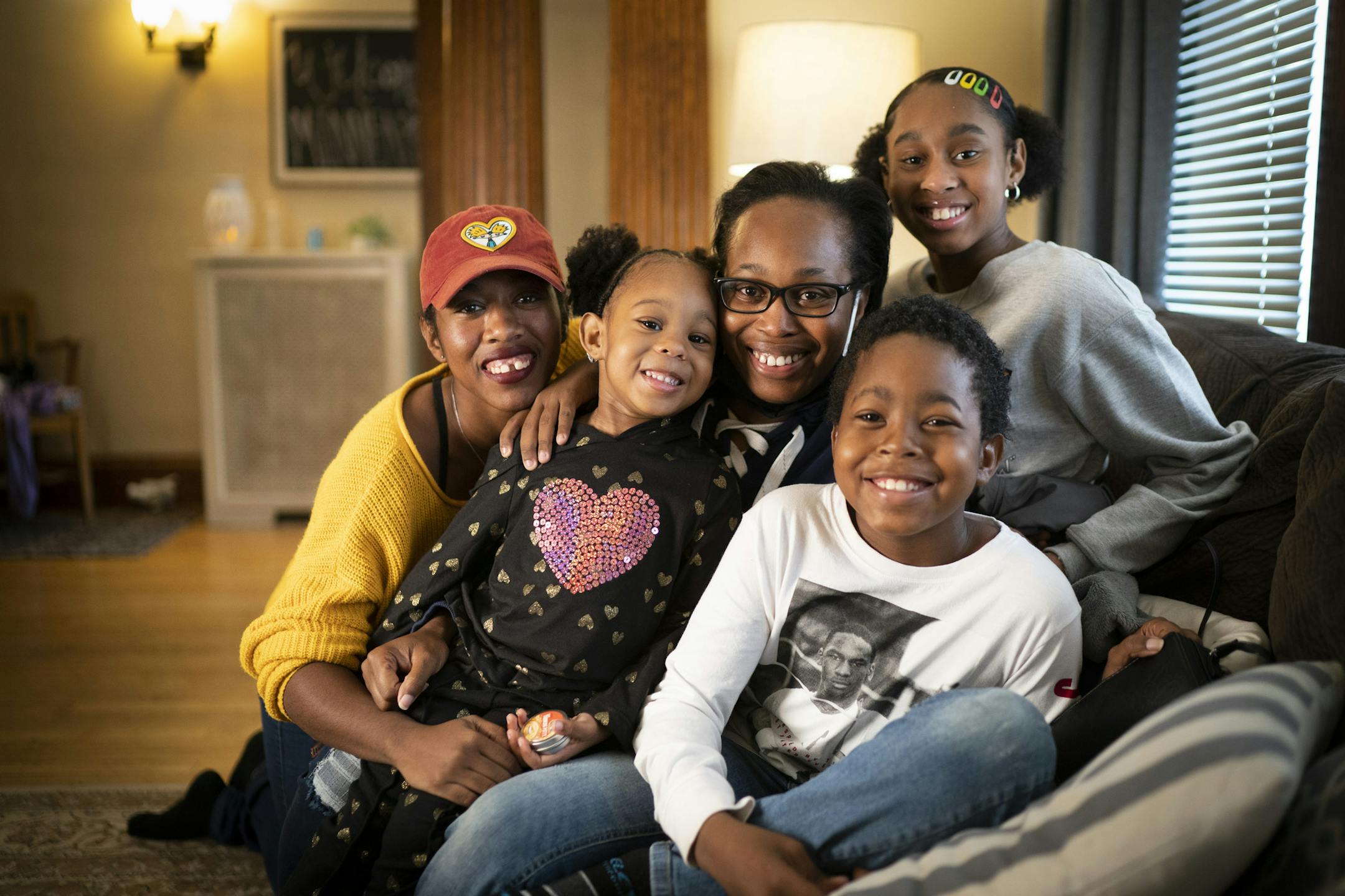 Staff Sgt. Farrah Kennedy, center with glasses, was photographed with her children Rayesha Kennedy, Frankie Higgins, Rayshawn Higgins and Ahkirrah Collier. Daughter Terrye Tolbert was not pictured.