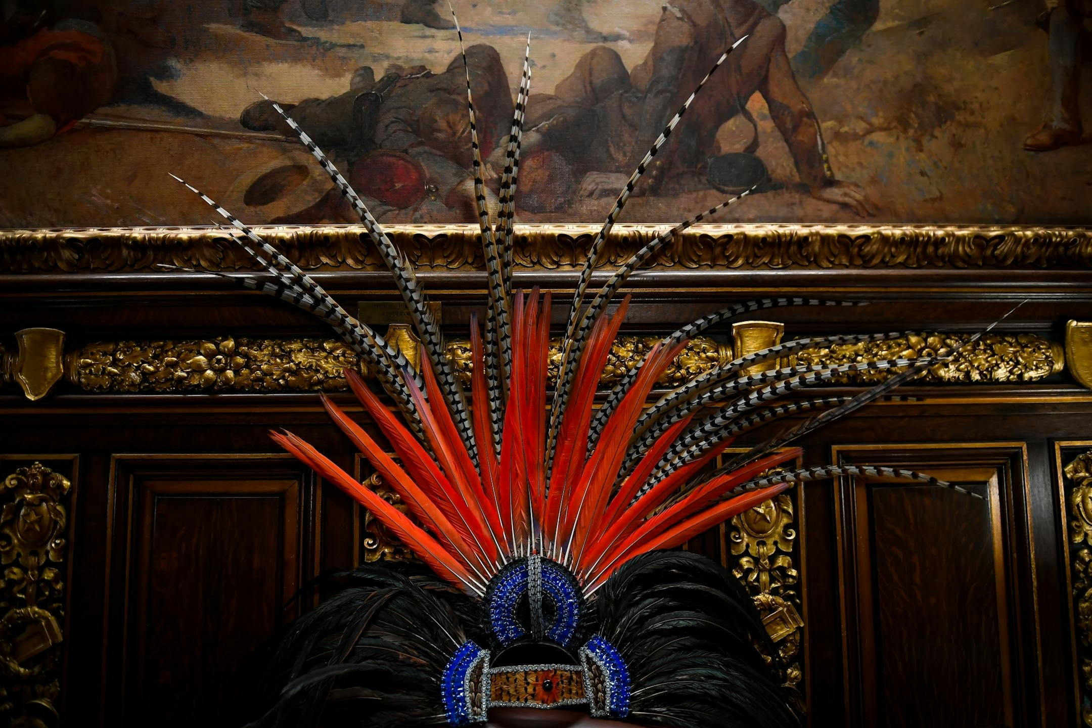 An Aztecan head dress was placed on a chair in the lobby of Gov. Mark Dayton's office Tuesday. Multiple immigration rights groups were waiting for a chance to meet with Dayton Tuesday night regarding drivers licenses for undocumented immigrants.