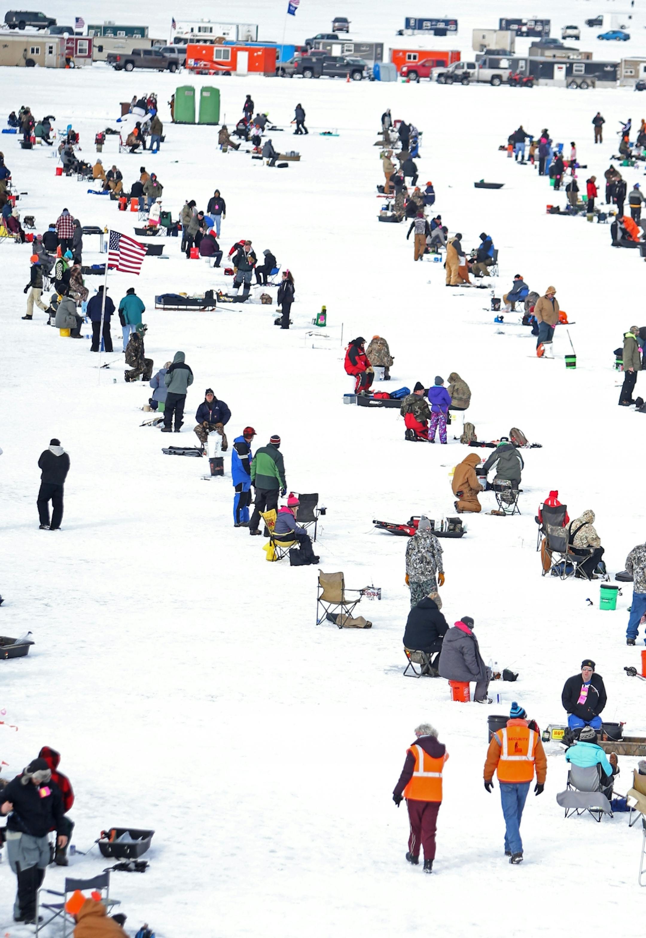 Some of the 10,000 ice fishing contestants on Hole in the Day Bay of Gull Lake during the Ice Fishing Extravaganza Saturday, Feb. 6, 2016, in Brainerd, MN.