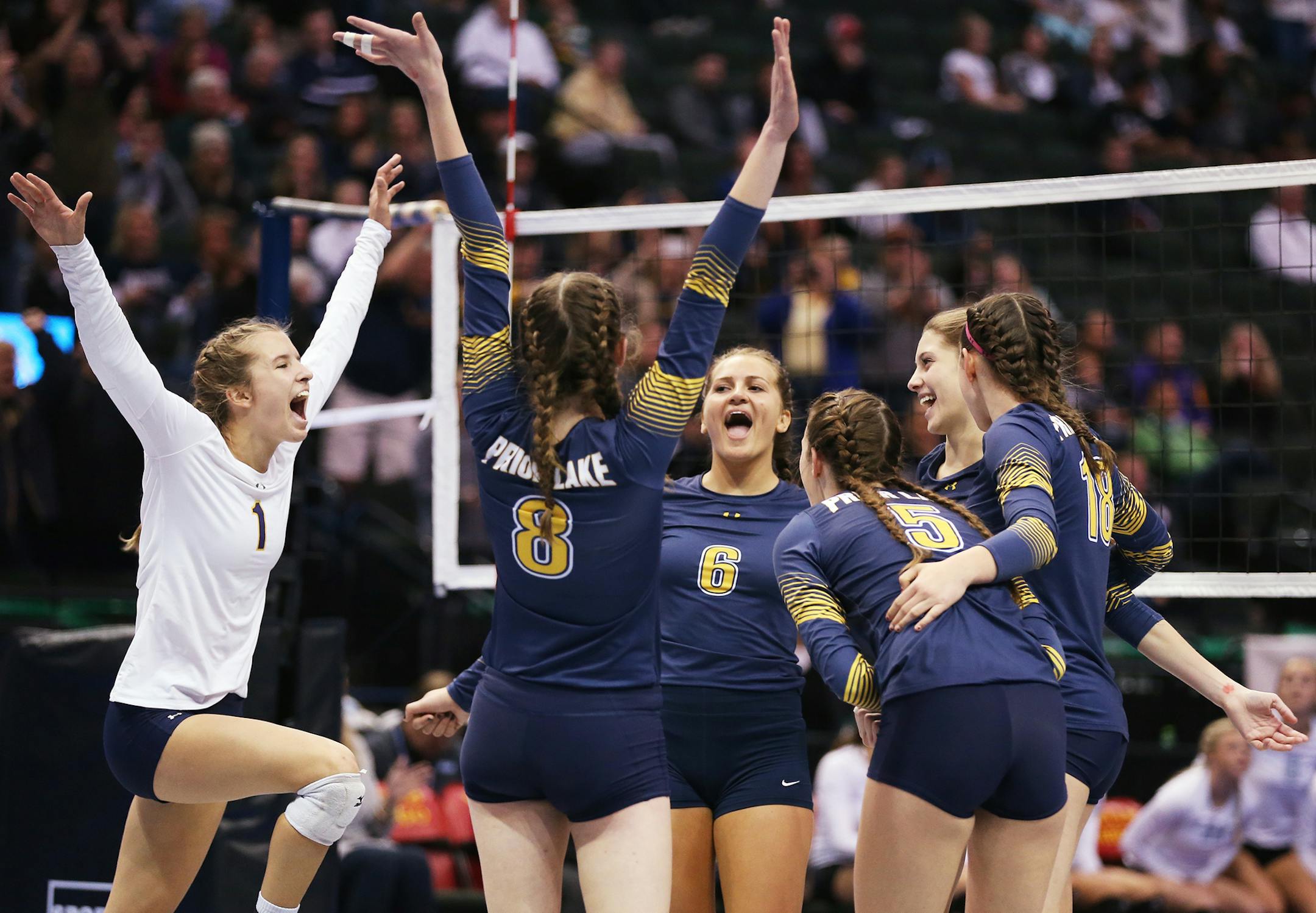 Prior Lake celebrates winning the match. ] (Leila Navidi/Star Tribune) leila.navidi@startribune.com Prior Lake and Hopkins play in the Class AAA girls volleyball state quarterfinals at the Xcel Energy Center in St. Paul on Thursday, November 12, 2015.