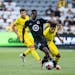 Loons forward Bongokuhle Hlongwane evaded a pair of Columbus players in the Loons’ round of 32 win Friday.