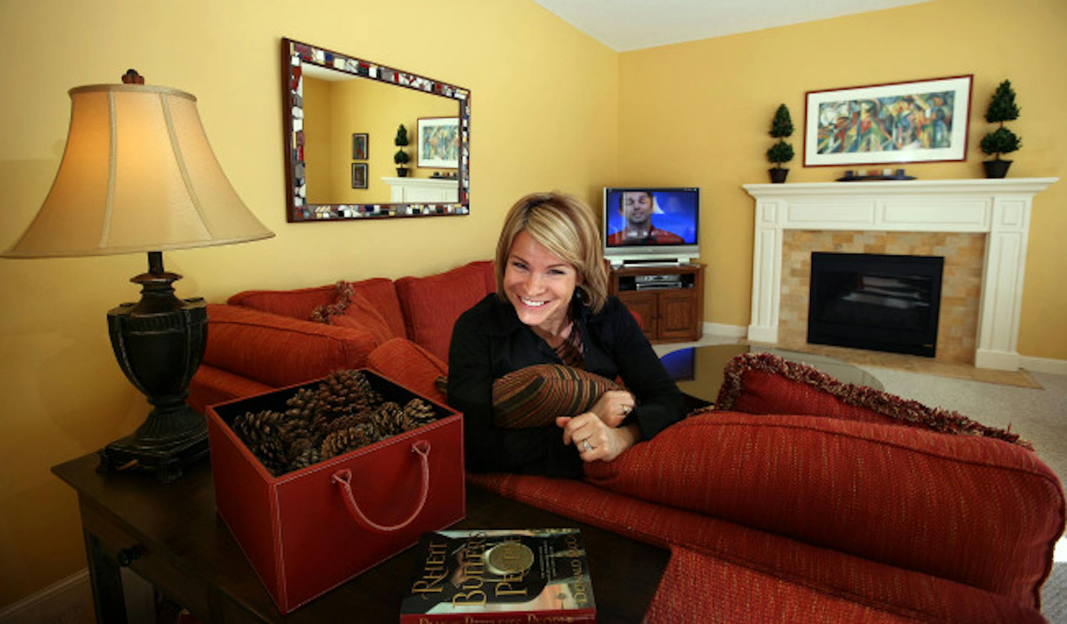 TOM WALLACE � twallace@startribune.comAssign#00001630A Slug: nhome0309 02/20/2008 Minneapolis, MN For the At Home feature for Sunday Source The home of Julia Cobbs has taken on a new look with a couple walls removed in her new mudd room but the most dramatic changes has taken place in her painting almost ever room and the old oak woodwork throughout the house. Julia Cobbs in her favorite room.