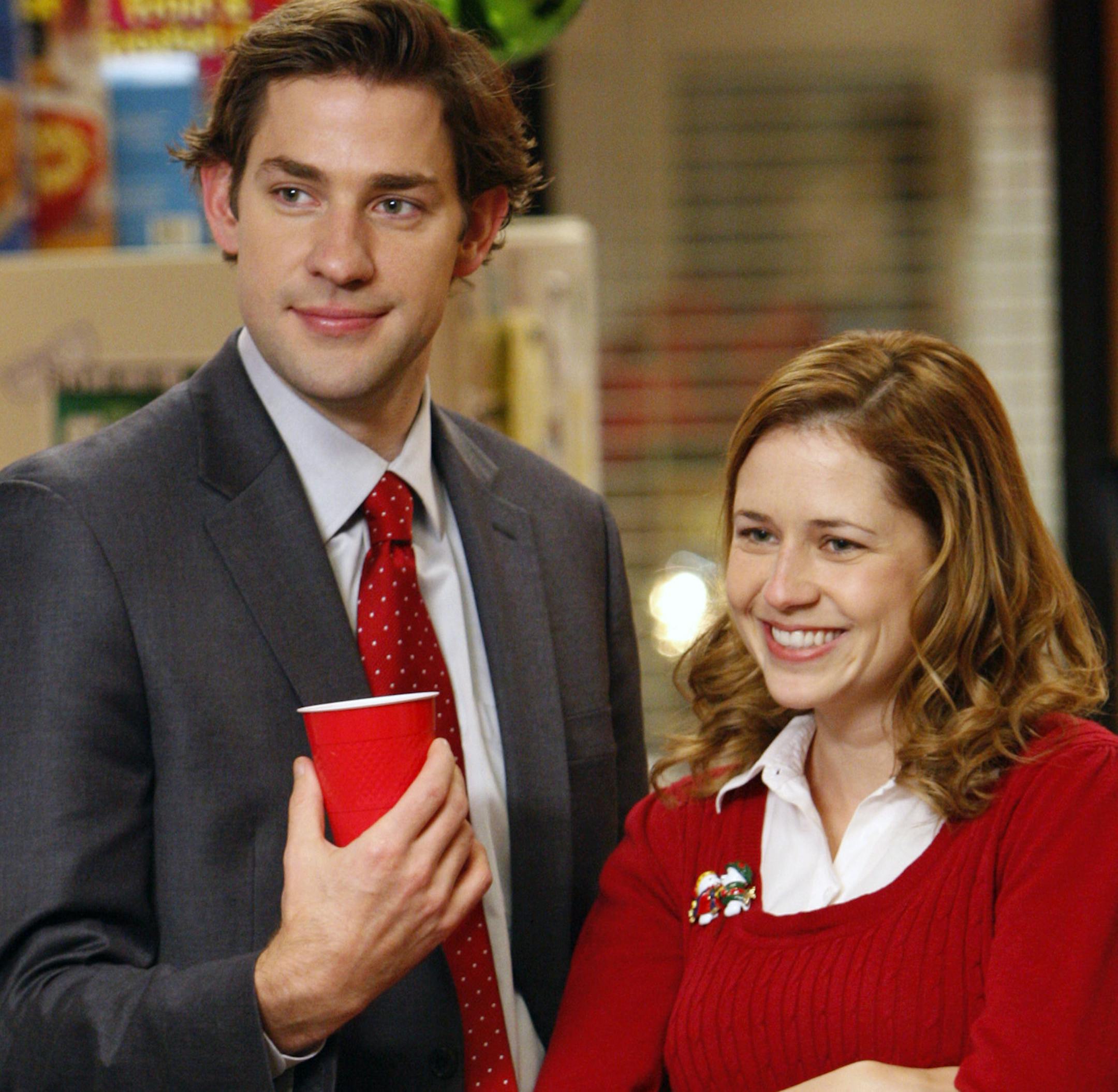THE OFFICE -- "Secret Santa" Episode 610 -- Pictured: (l-r) John Krasinski as Jim Halpert, Jenna Fischer as Pam Beesly -- NBC Photo: Chris Haston