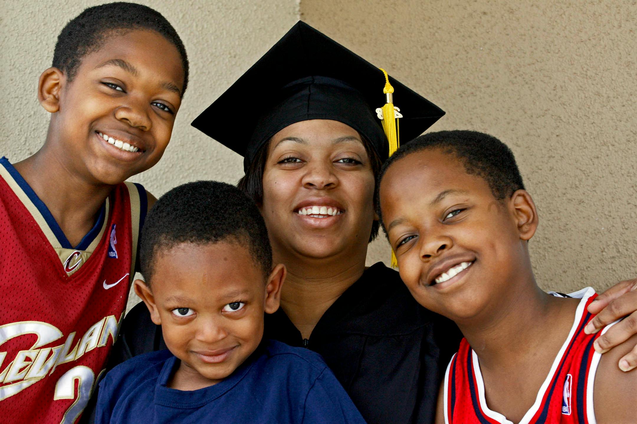 From left, son Avery Toliver, 12, son Amari Wallace, 5, Jennifer Banks and son Anthony Toliver, 10.