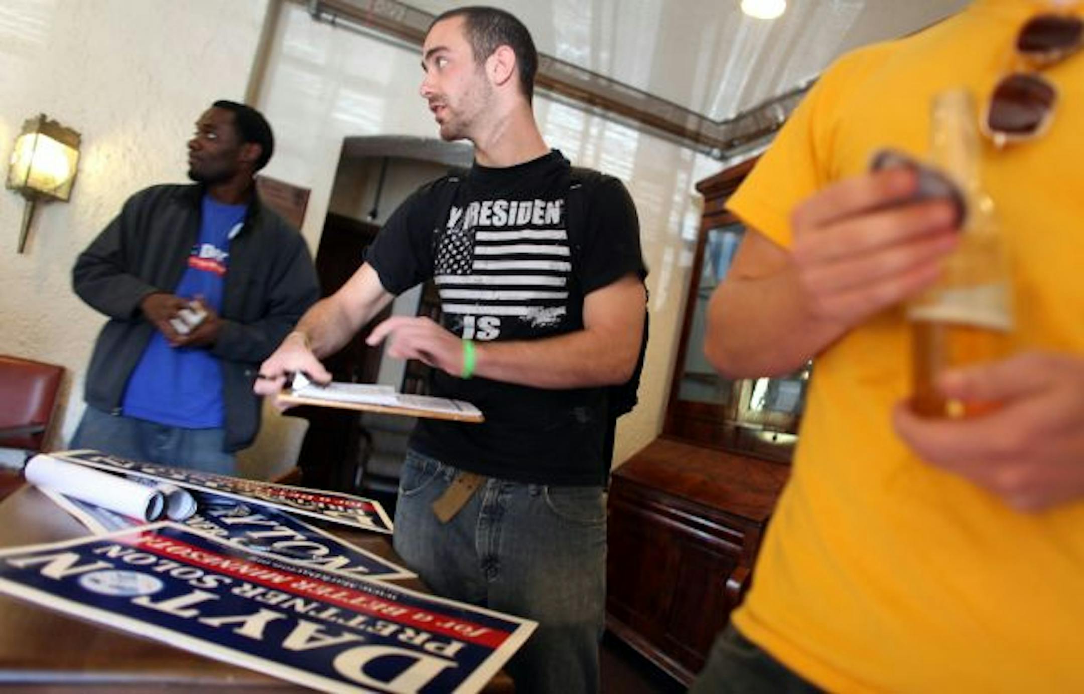 Jeb Saelens, along with other volunteers with Organizing for America, tried to make sure everyone in the living room of the Sigma Chi fraternity was registered to vote.