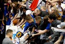 Golden State Warriors Steph Curry signed autographs after his pregame warm up before Monday night's game at Target Center. ] CARLOS GONZALEZ cgonzalez