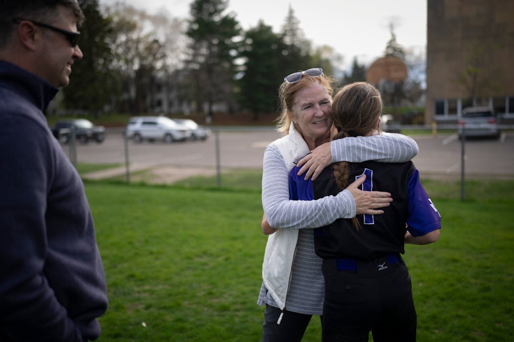 Teresa Mauer hugged her granddaughter Lauren Mauer after her softball game at Cretin-Derham Hall in St. Paul. When Teresa tells her granddaughters that there was no softball team when she was in high school, they're in disbelief: 