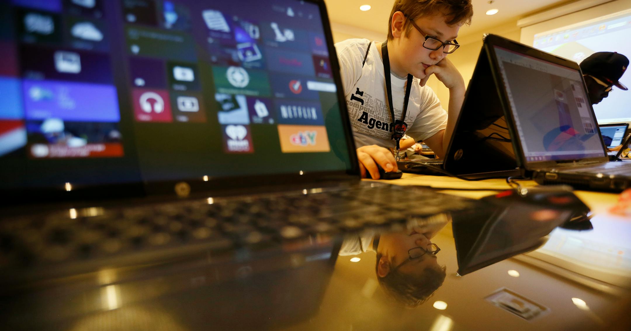 Andrew Ramlet was with about 100 students who gathered at the Minneapolis Central Library in a two-day Geek Squad Academy Camp Wednesday in Minneapolis.