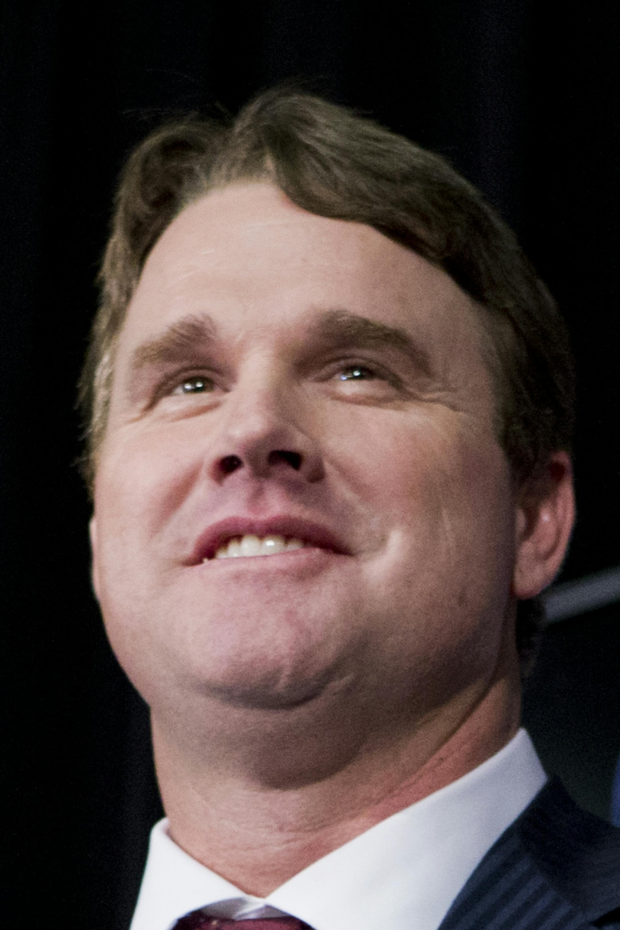 New Washington Redskins head coach Jay Gruden, holds a Redskins helmet at the Redskins Park in Ashburn, Va., Thursday, Jan. 9, 2014. Jay Gruden was introduced as the new Washington Redskins head coach, replacing Mike Shanahan and becoming the team&#xed;s eighth head coach since Daniel Snyder purchased the franchise in 1999. (AP Photo/Manuel Balce Ceneta)