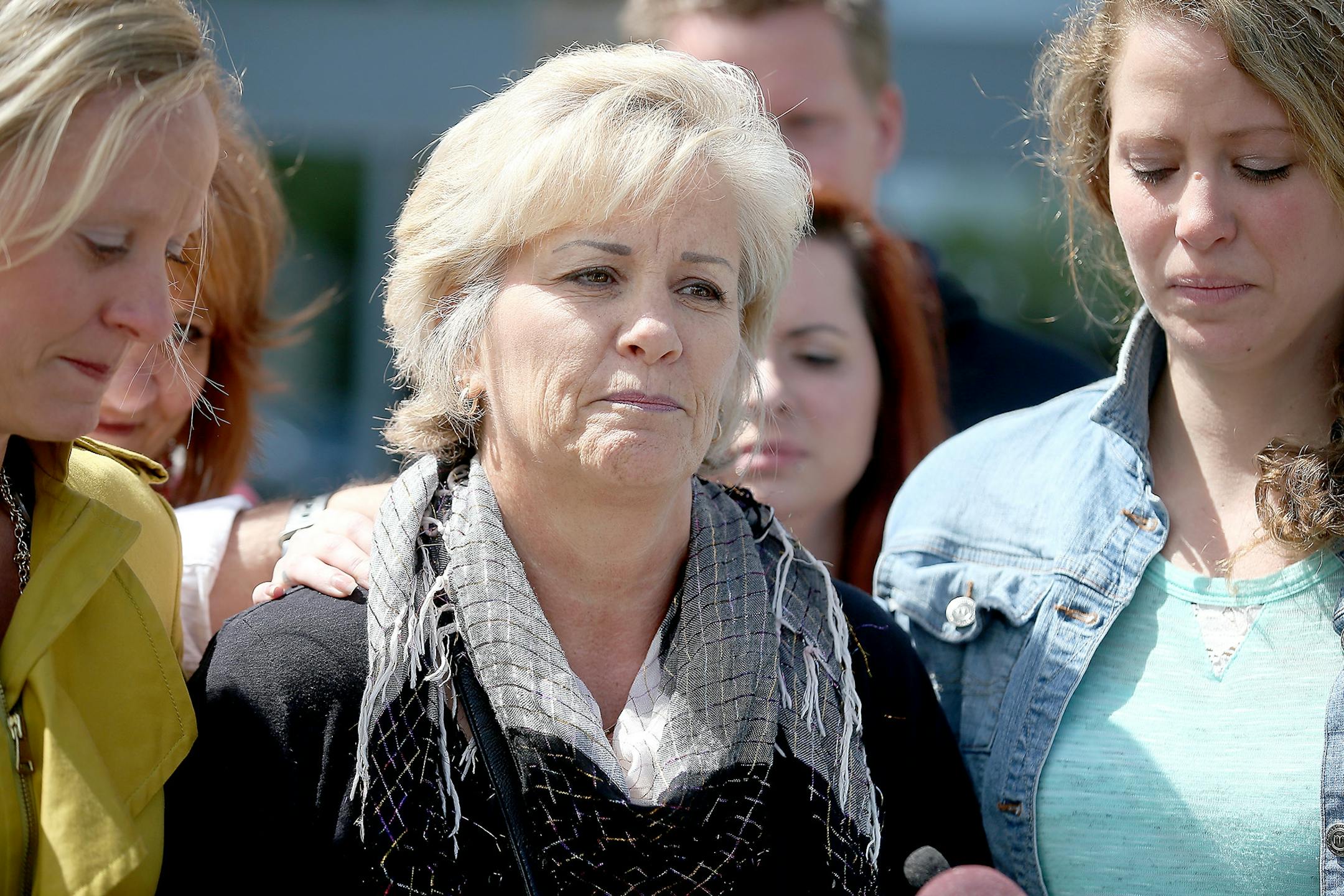 Wife of slain police officer Todd Besser, Gwen Besser asked for prayer, healing and forgiveness after leaving the Wright County Government Center, Tuesday, May 12, 2015 in Buffalo, MN.