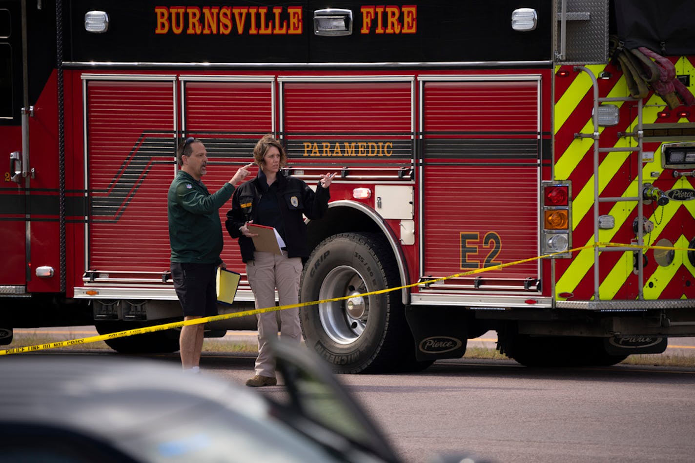 A BCA investigator, right, was briefed on the scene Sunday afternoon. ] JEFF WHEELER • jeff.wheeler@startribune.com