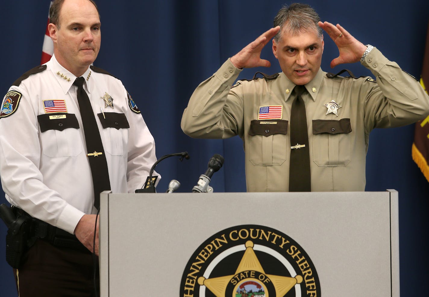 Hennepin County Sheriff Richard W. Stanek, left, and Major J.R. Storms spoke about the addition of a policy regarding religious head coverings for inmates.