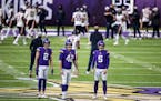 Minnesota Vikings punter Britton Colquitt (2),long snapper Andrew DePaola, and kicker Dan Bailey (5) during pregame. ] Jerry Holt •Jerry.Holt@startr