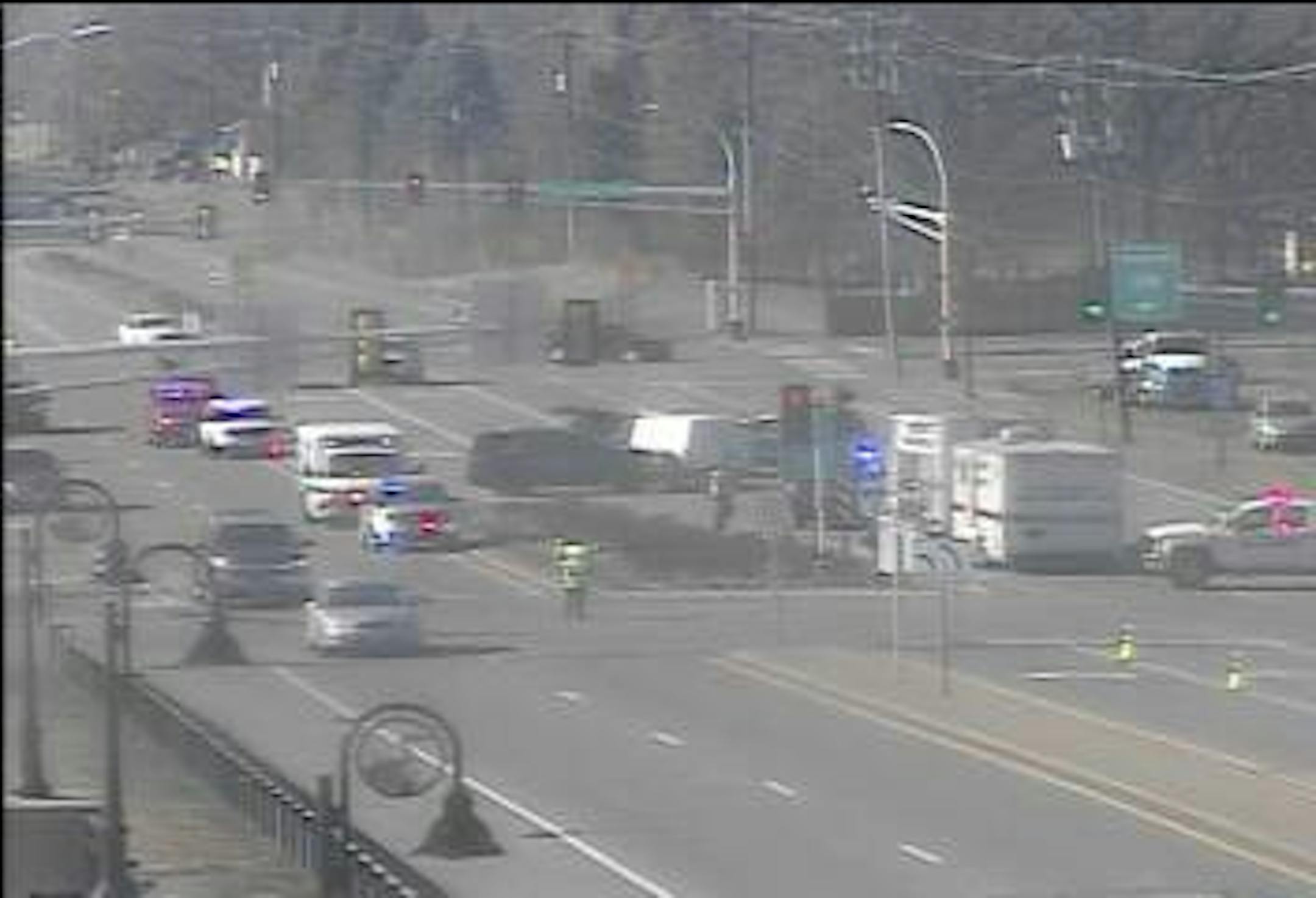 This photo from a MnDOT traffic camera captured the scene where Blaine officers fell ill. The suspects were in a white van.