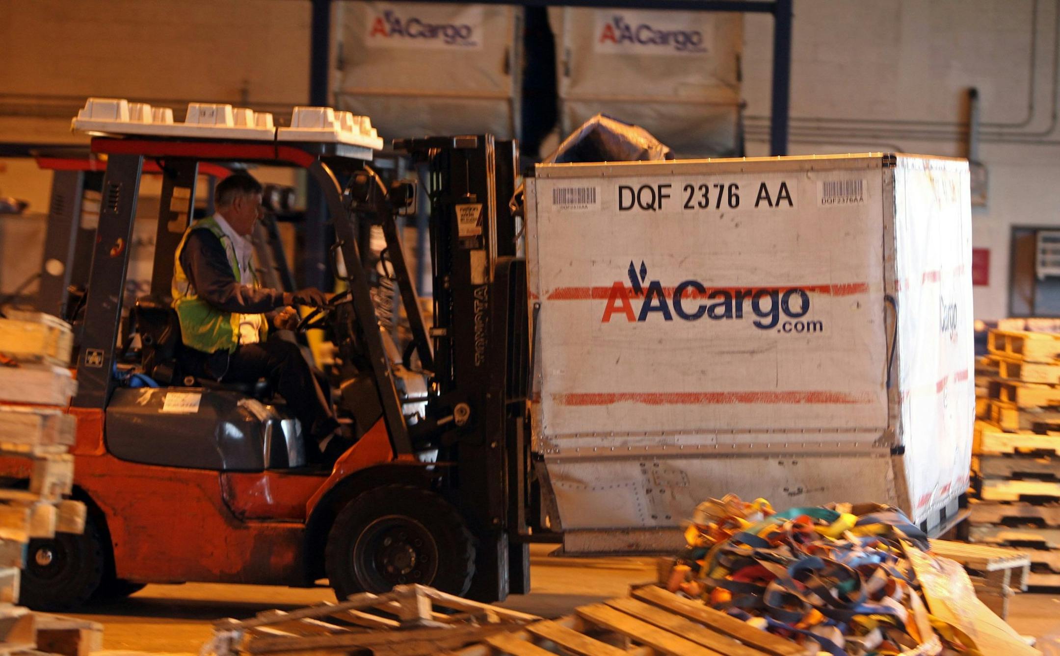 Outbound cargo is moved by American Airlines Cargo at Miami International Airport in Miami, Wednesday Jan. 8, 2014. (Walter Michot/Miami Herald/MCT) ORG XMIT: 1148220