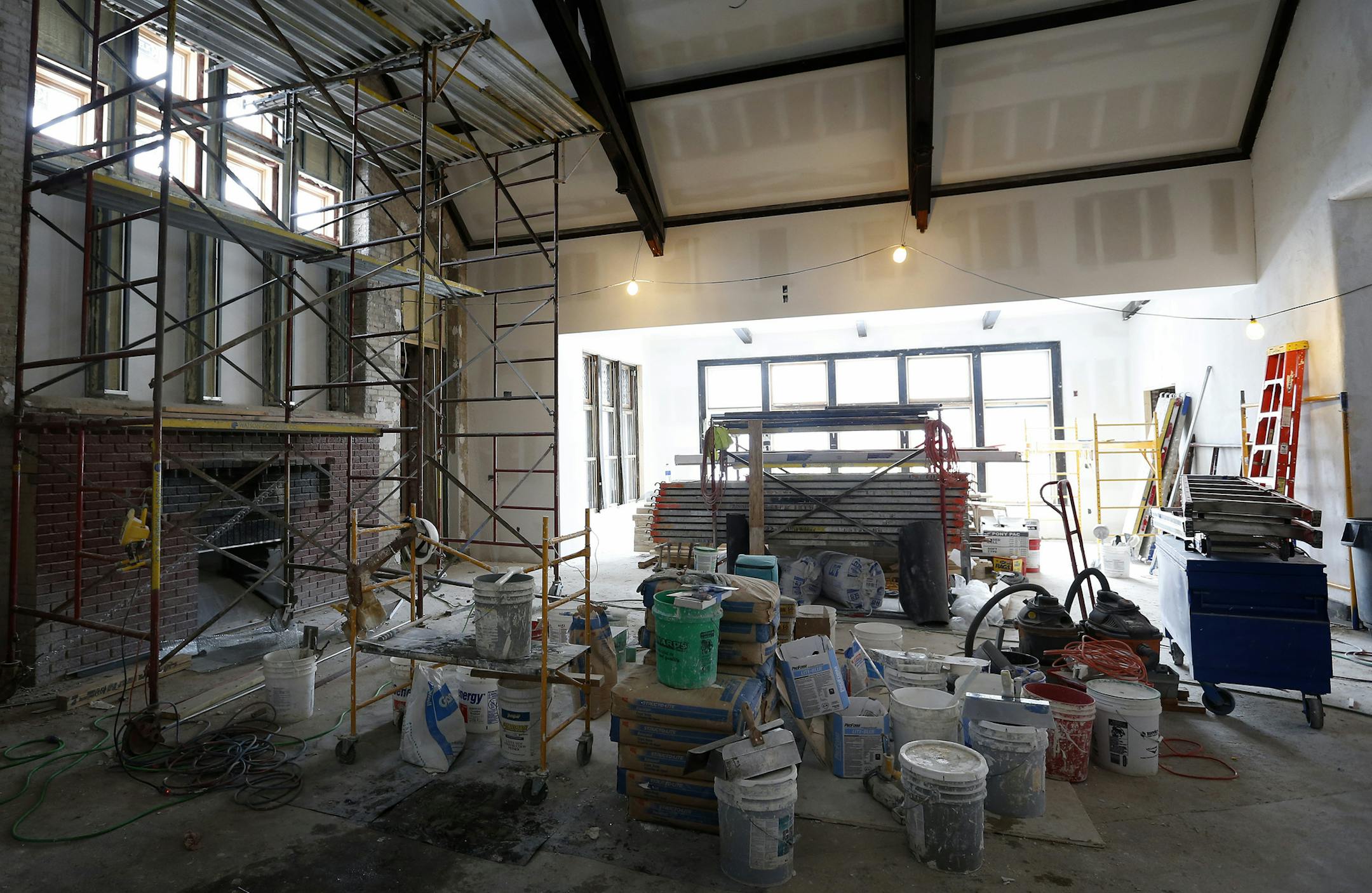 The old North Branch Library is nearing completion as a new job training center in North Minneapolis. ] CARLOS GONZALEZ cgonzalez@startribune.com - November 11, 2014, Minneapolis, Minn., when Mike Wynne moved his EMERGE nonprofit into Broadway and Emerson on the North Side, the building outside his window caught his eye. Seven years and some false starts later, the old North Branch Library is nearing completion as a new job training center to serve the area's residents who need job skills.