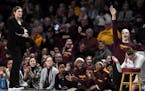 The Gopher bench celebrated a second quarter basket against the Iowa Hawkeyes. "We'll continue to battle," coach Lindsay Whalen said after her team's 