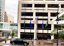 Flags at half staff Friday in downtown Minneapolis.