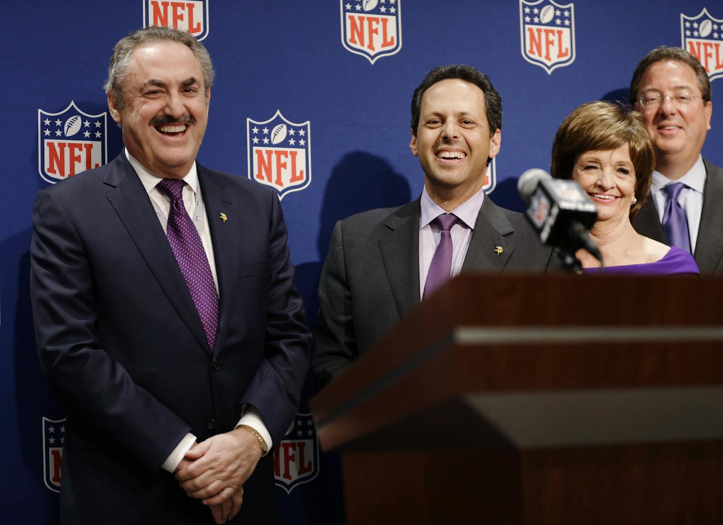 Vikings owners Zygi Wilf, left, and Mark Wilf, right, spoke at a news conference announcing that Minneapolis was selected as the host for 2018 Super Bowl. Also shown are Minneapolis bid co-char Marilyn Carlson Nelson and Vikings Vice President Lester Bagley.