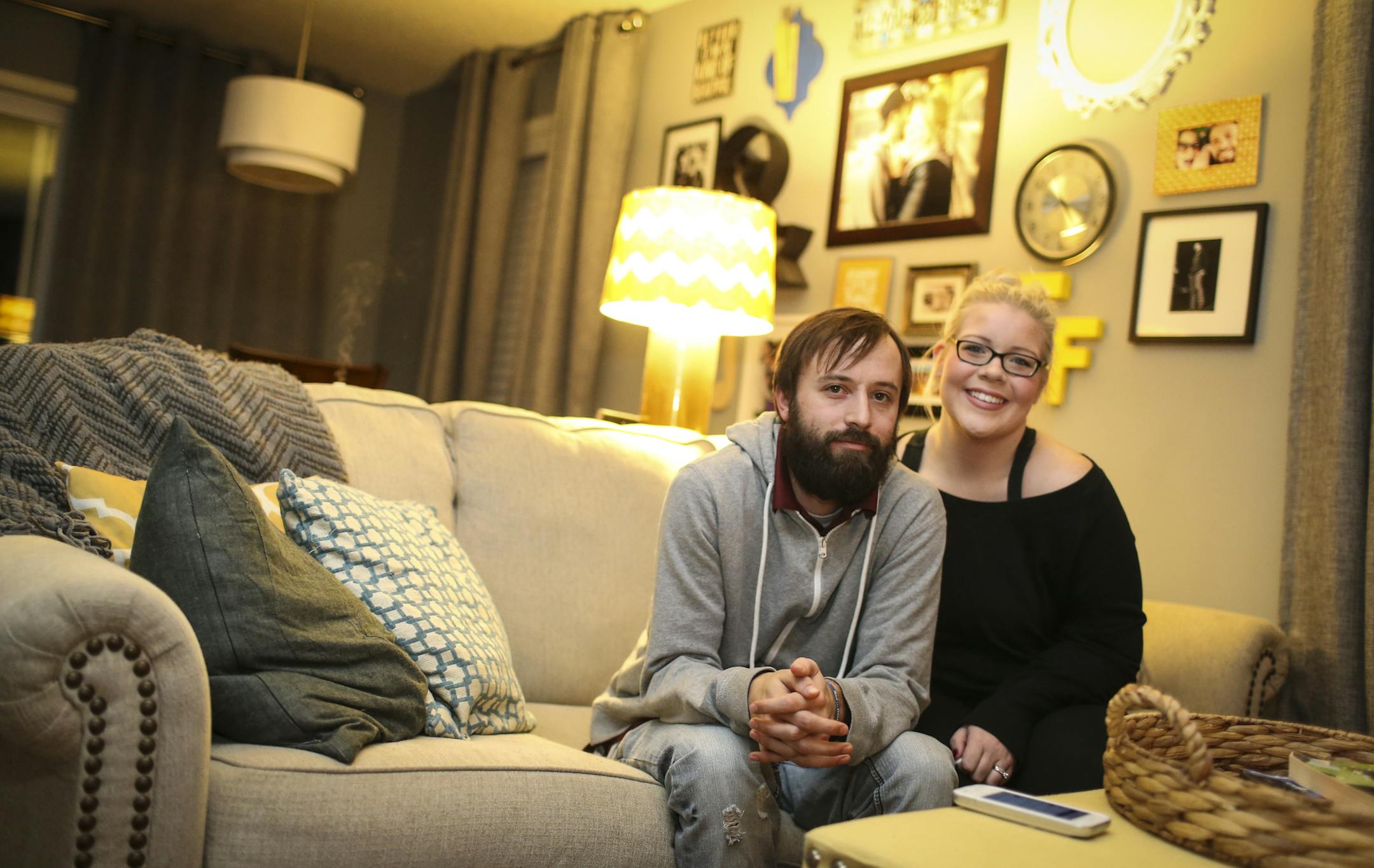 Missi and Tyler Franz in the living room of their new home in Columbia Heights, Minn. ] REN√âE JONES SCHNEIDER reneejones@startribune.com The city of Columbia Heights bought some of the ugliest, skankiest houses in the city. They tore them down and built new, sleek 1200 sq ft two stories designed for those conflicted young homebuyers torn between the city and the suburbs .Photographs taken on Tuesday, December 23, 2014, in Columbia Heights, Minn.