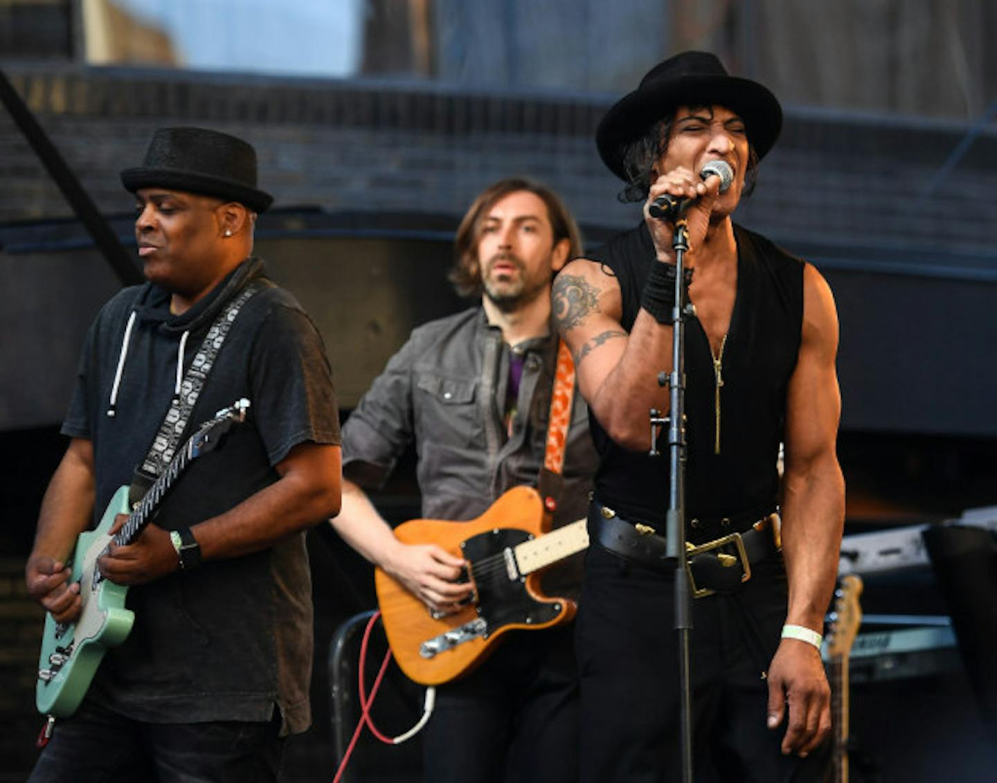 Tony Christian of Mazarati, right, performed 'DMSR' and 'Kiss' with guitarists Homer O'Dell and Jeremy Ylvisaker outside First Avenue on Saturday. / Aaron Lavinsky, Star Tribune