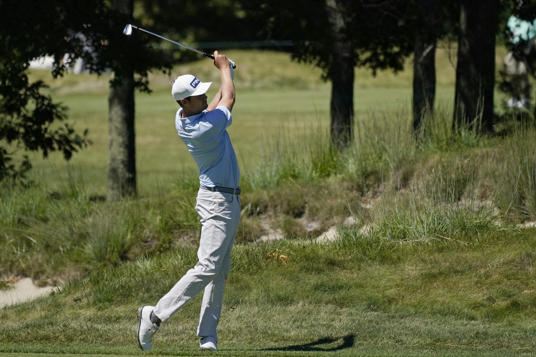 Harris English hits from the fairway on the 15th hole in the first round of the Northern Trust golf tournament at TPC Boston, Thursday, Aug. 20, 2020, in Norton, Mass. (AP Photo/Charles Krupa)