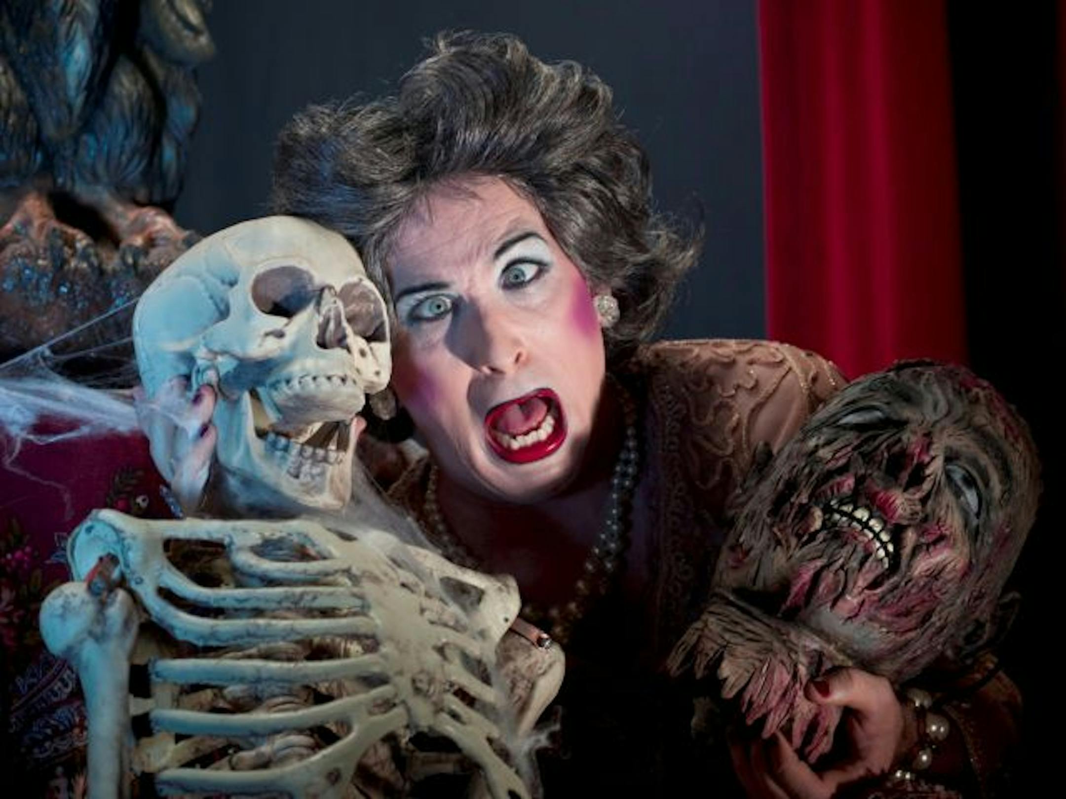 Scary stuff: Mrs. Smith (David Hanbury) hosts a "Halloween Spooktacular."