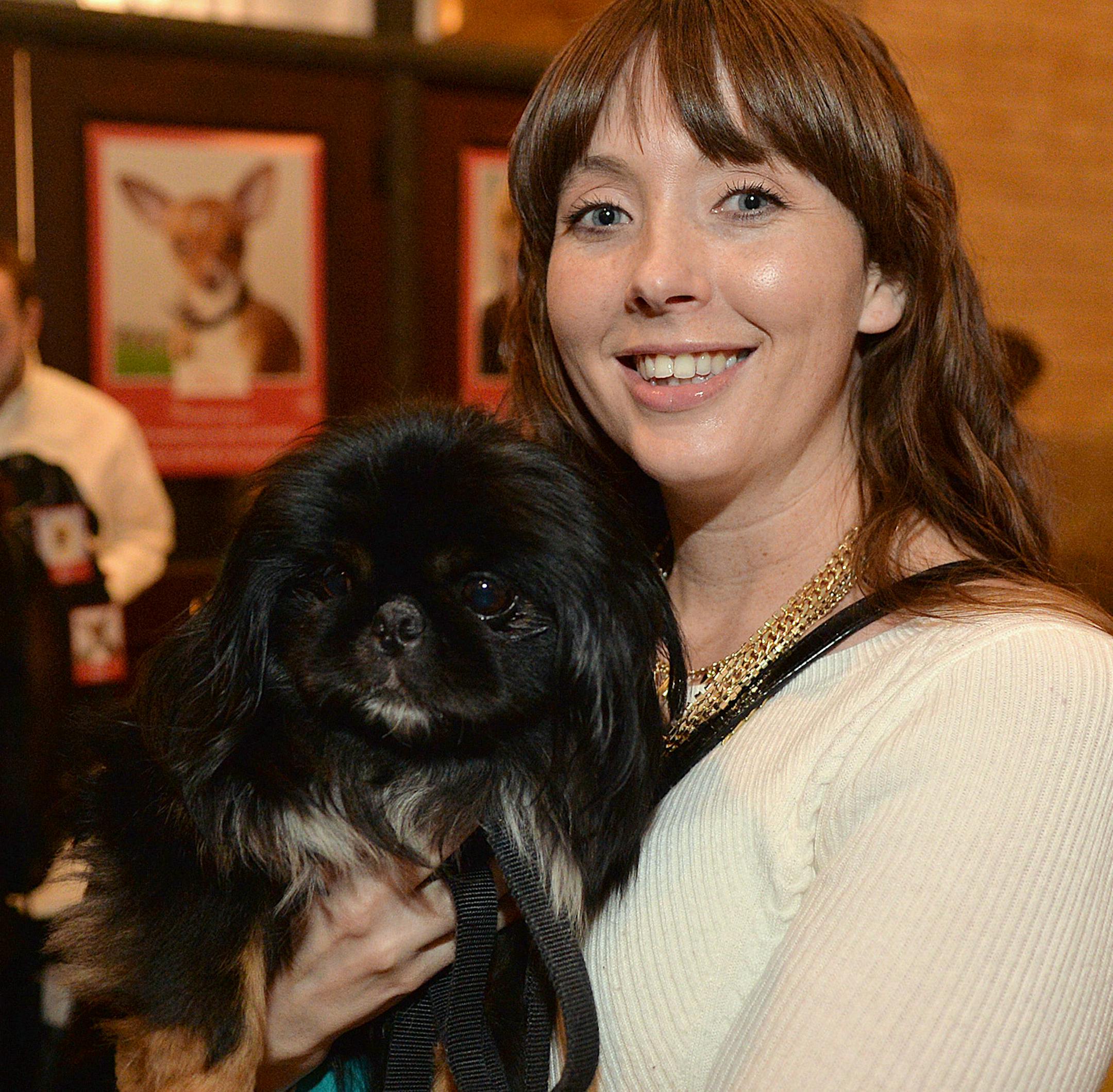 Tawnya Gelle with Mork, a Pekingese up for adoption through Secondhand Hounds. ] (SPECIAL TO THE STAR TRIBUNE/BRE McGEE) **Tawnya Gelle, Mork (Pekingese in foster care)
