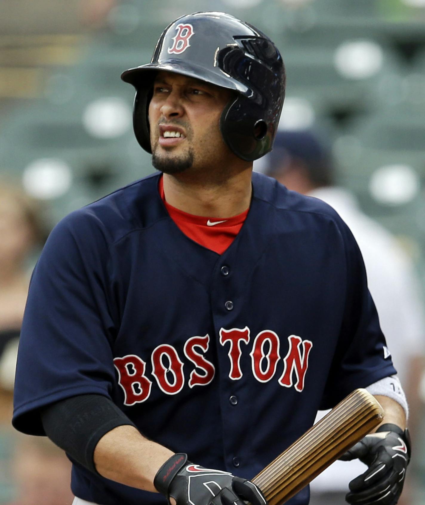 Boston Red Sox's Shane Victorino looks back at the mound after striking out against Texas Rangers' Yu Darvish in the first inning of a baseball game, Friday, May 9, 2014, in Arlington, Texas. (AP Photo/Tony Gutierrez)