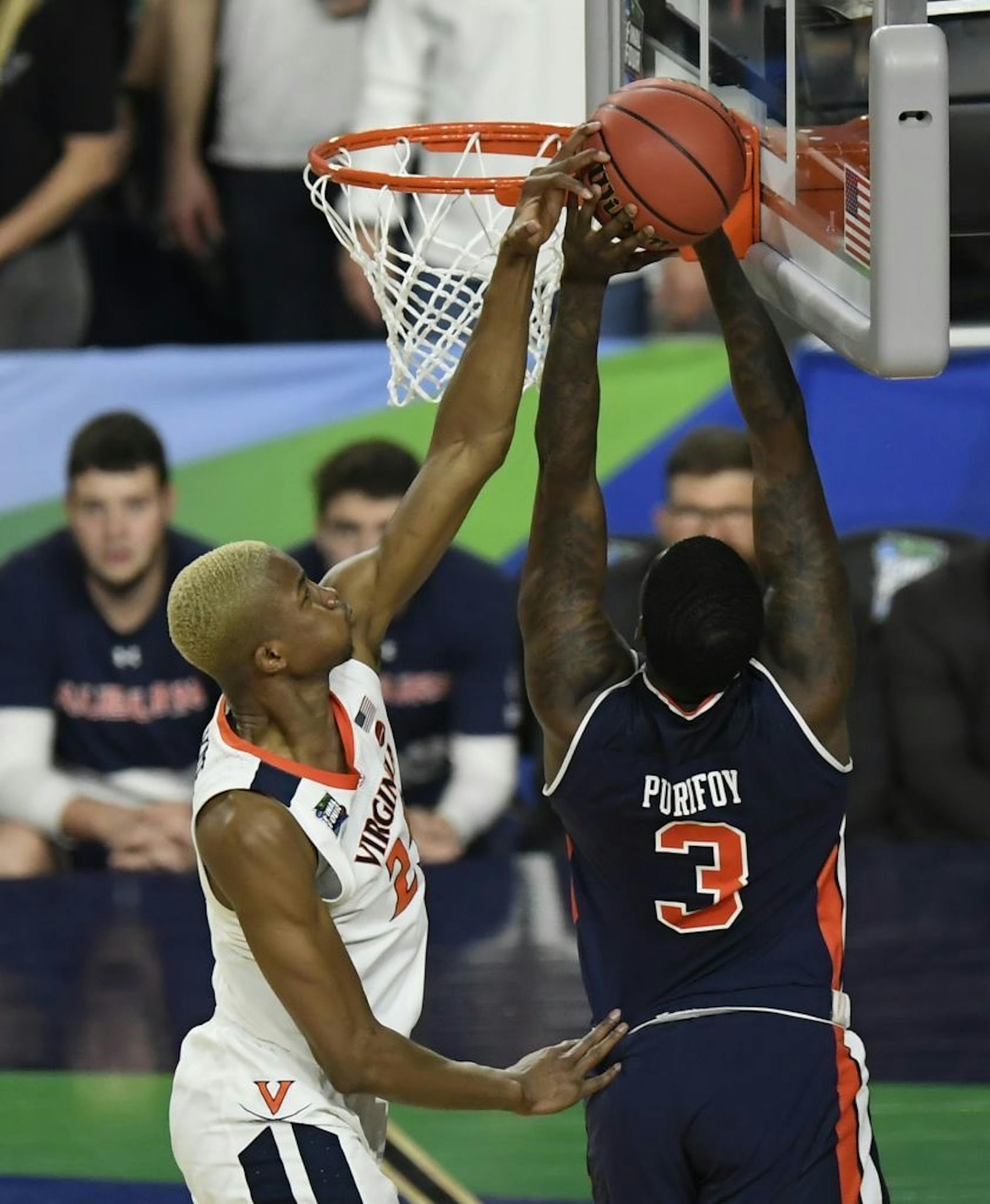 Virginia Cavaliers forward Mamadi Diakite (25) blocked the shot of Auburn forward Danjel Purifoy (3) during the second half. Virginia won 63-62.