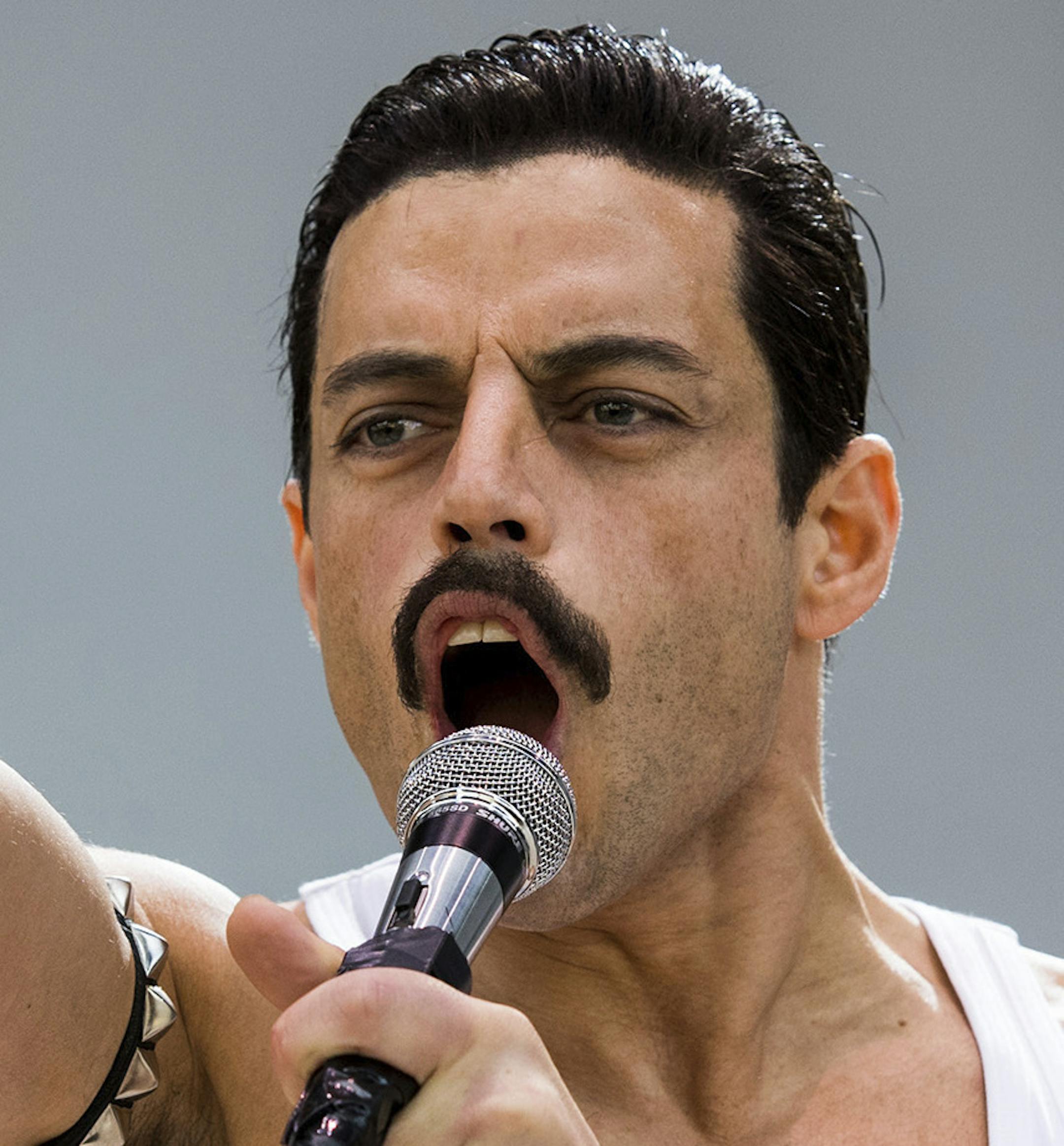 This image released by Twentieth Century Fox shows Rami Malek in a scene from "Bohemian Rhapsody." On Thursday, Dec. 6, 2018, Malek was nominated for a Golden Globe award for lead actor in a motion picture drama for his role in the film. The 76th Golden Globe Awards will be held on Sunday, Jan. 6. (Alex Bailey/Twentieth Century Fox via AP)
